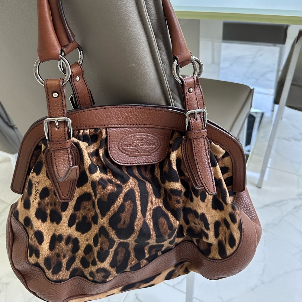Dolce& Gabbana, leather and canvas leopard bag.